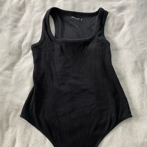 Bodysuit in black never worn